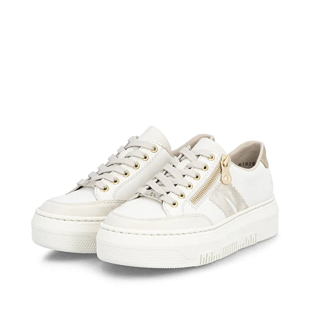 Off-white leather trainers with laces, zip detail, and chunky sole, featuring beige accents and a casual style.