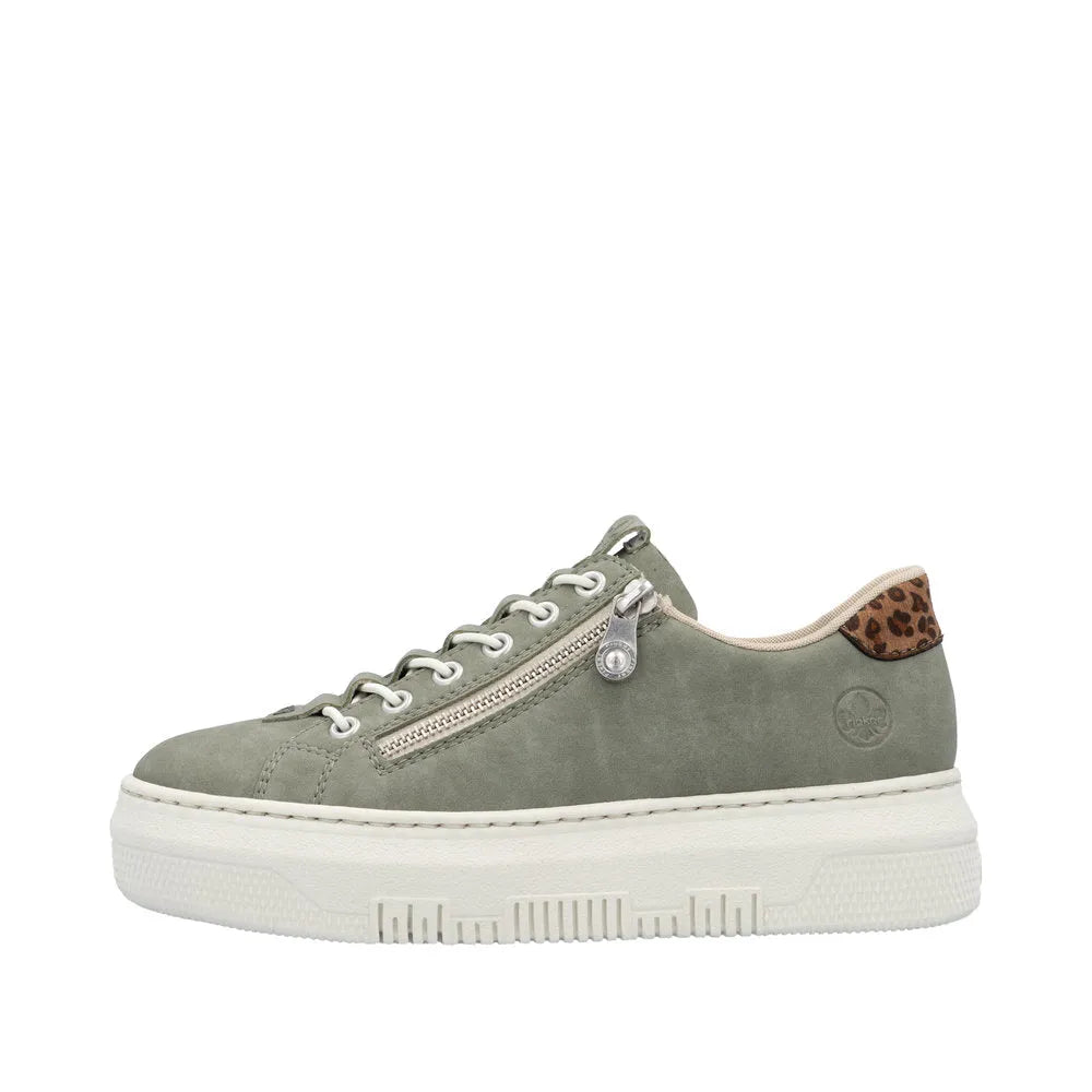 Rieker M1952-52 women's green slip-on sneakers with zipper, lace-up, leopard print detail, and chunky white sole.