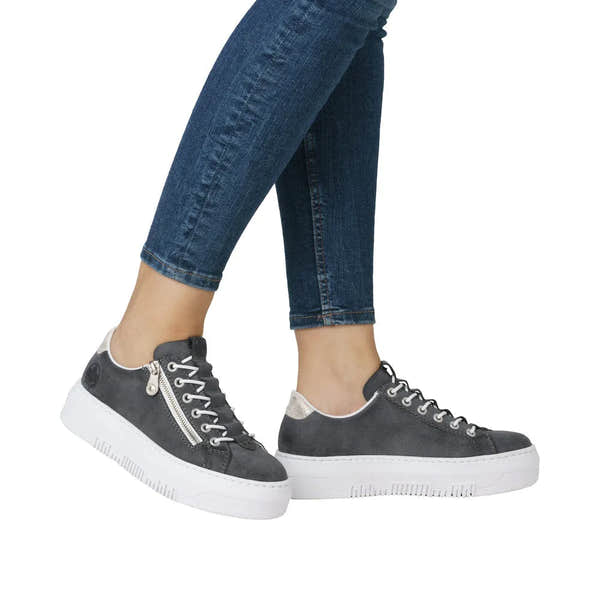 Rieker M1953-14 navy women's zip and lace casual sneakers with white soles, ankle patches, and zipper detail.