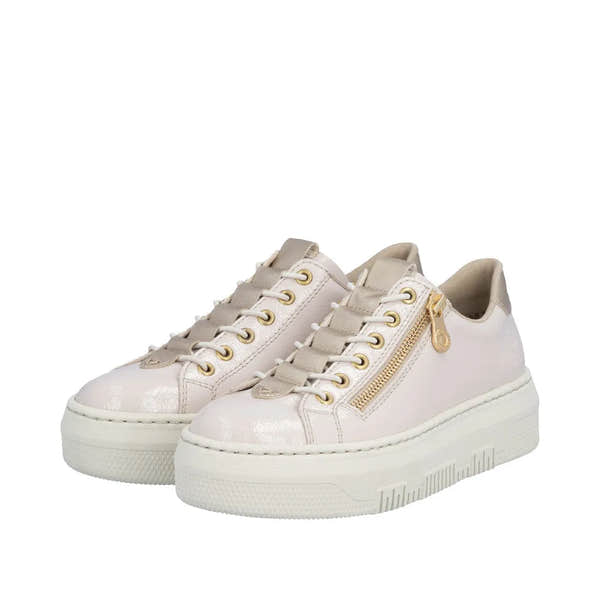 Rieker M1953-80 women's off-white patent trainers with side zip, beige laces, gold zipper detail, chunky sole, and metallic accents.
