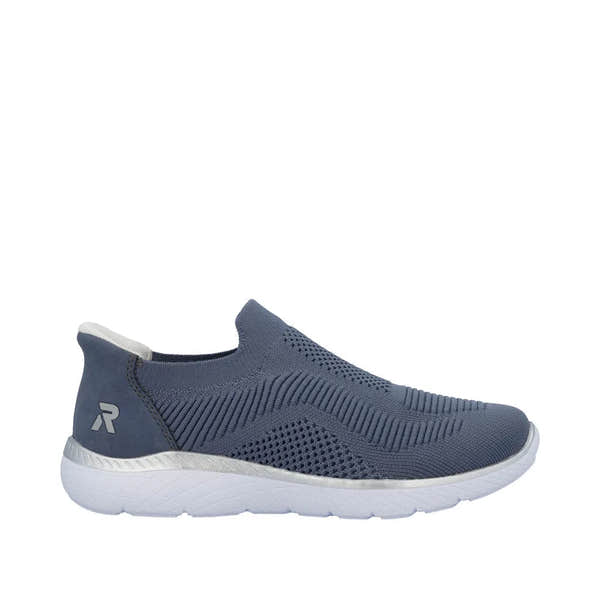 Rieker M5072-10 ladies' wide-fit slip-on trainers with textile upper, navy color, and white sole. Comfortable, casual footwear.