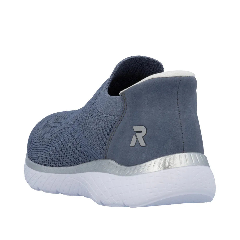 Rieker M5072-10 ladies' wide-fit slip-on trainers with textile upper, grey color, cushioned sole, and stylish slip-on design.