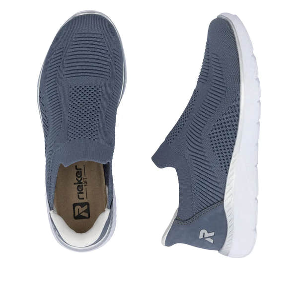 Rieker M5072-10 ladieswide-fit slip-on trainers in textile with breathable knit upper and white rubber sole.