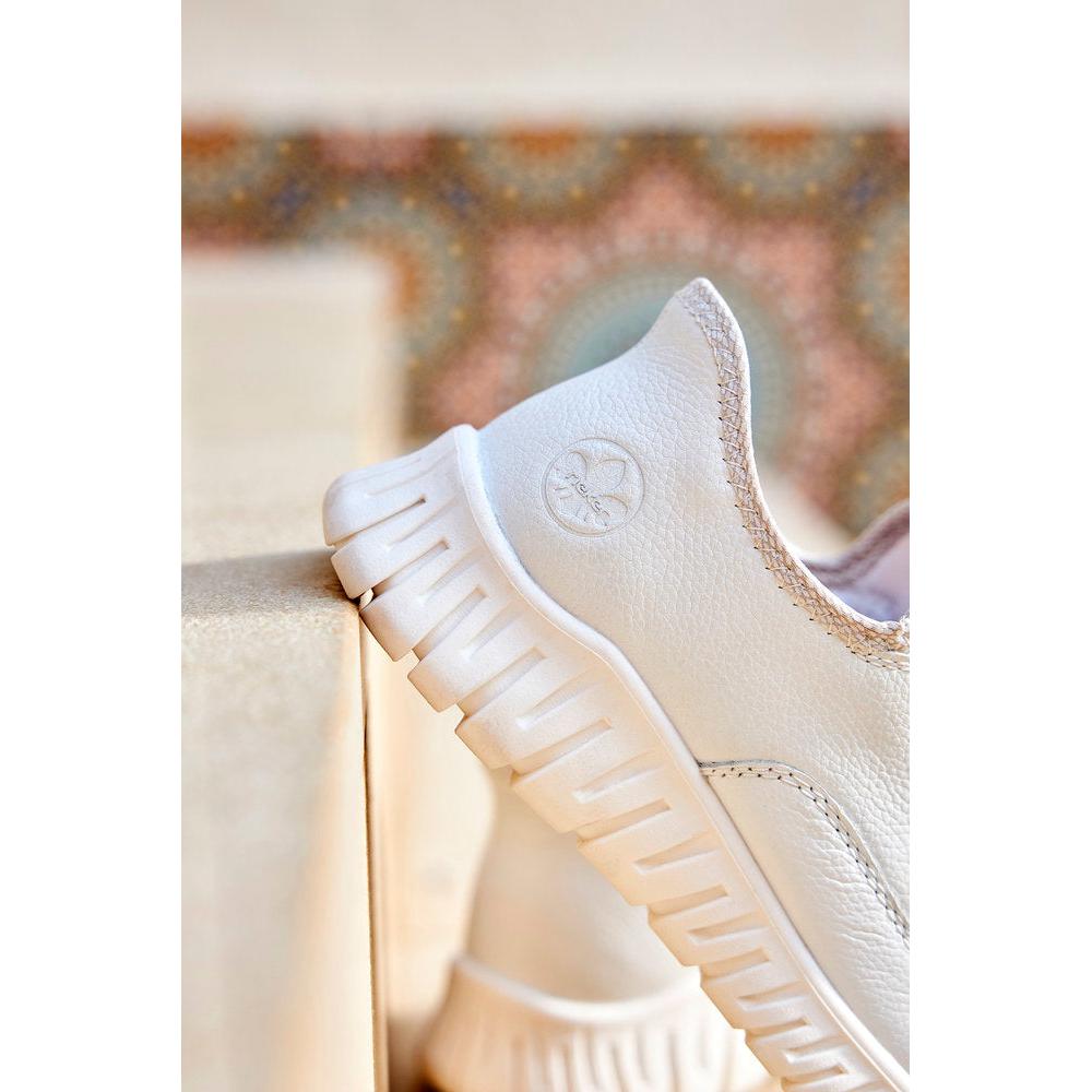 Rieker M5357-80 women's wide fit beige and white leather elasticated trainers with chunky soles.