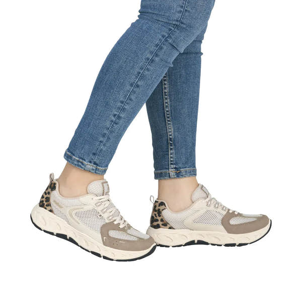 Rieker M6501-60 women's wide beige and brown textile lace-up trainers with leopard print accents and chunky soles.