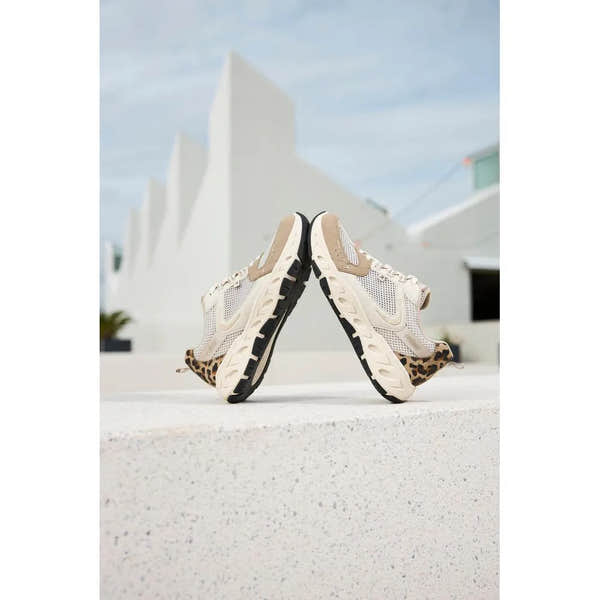 Rieker M6501-60 ladies wide fit beige and brown textile lace-up trainers with leopard print accents and thick black sole.
