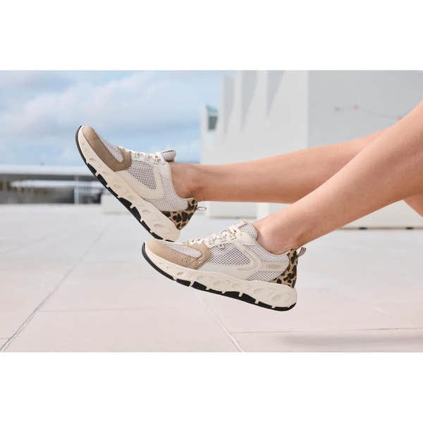 Rieker M6501-60 ladies wide brown/beige textile lace-up trainers with leopard print accents and cushioned soles.