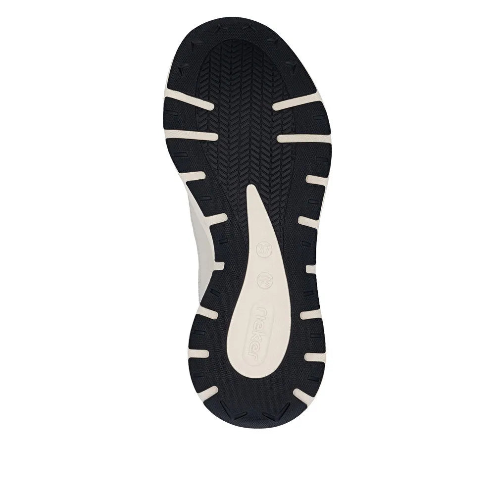 Black and white textured sneaker sole with tread pattern, designed for Rieker M6501-60 ladies' wide brown/beige lace-up trainers.