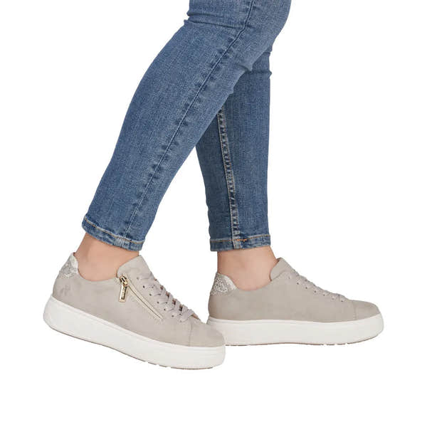 Rieker M7701-60 ladies off-white suede sneakers with lace-up and side zipper details, chunky white sole.