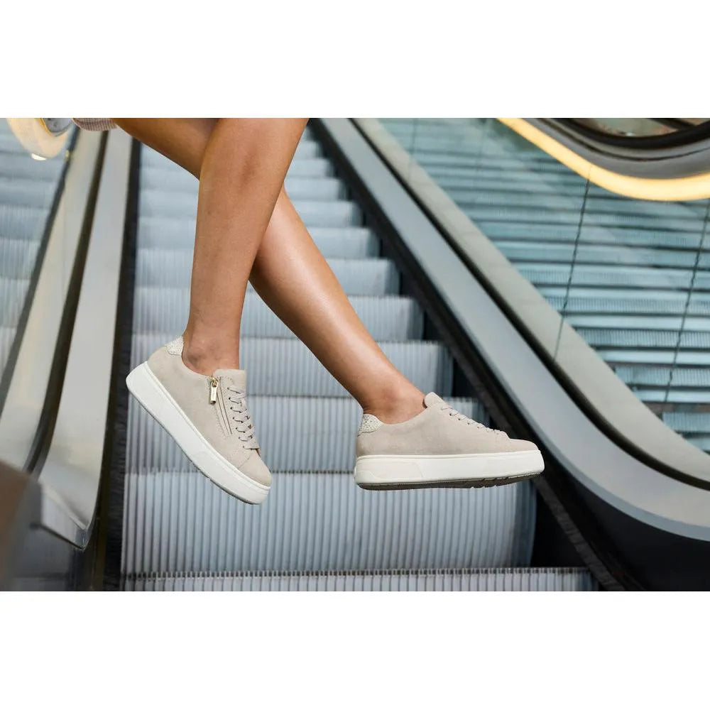 Off white suede lace-up shoes with zip detail, chunky soles, and subtle textured accents.