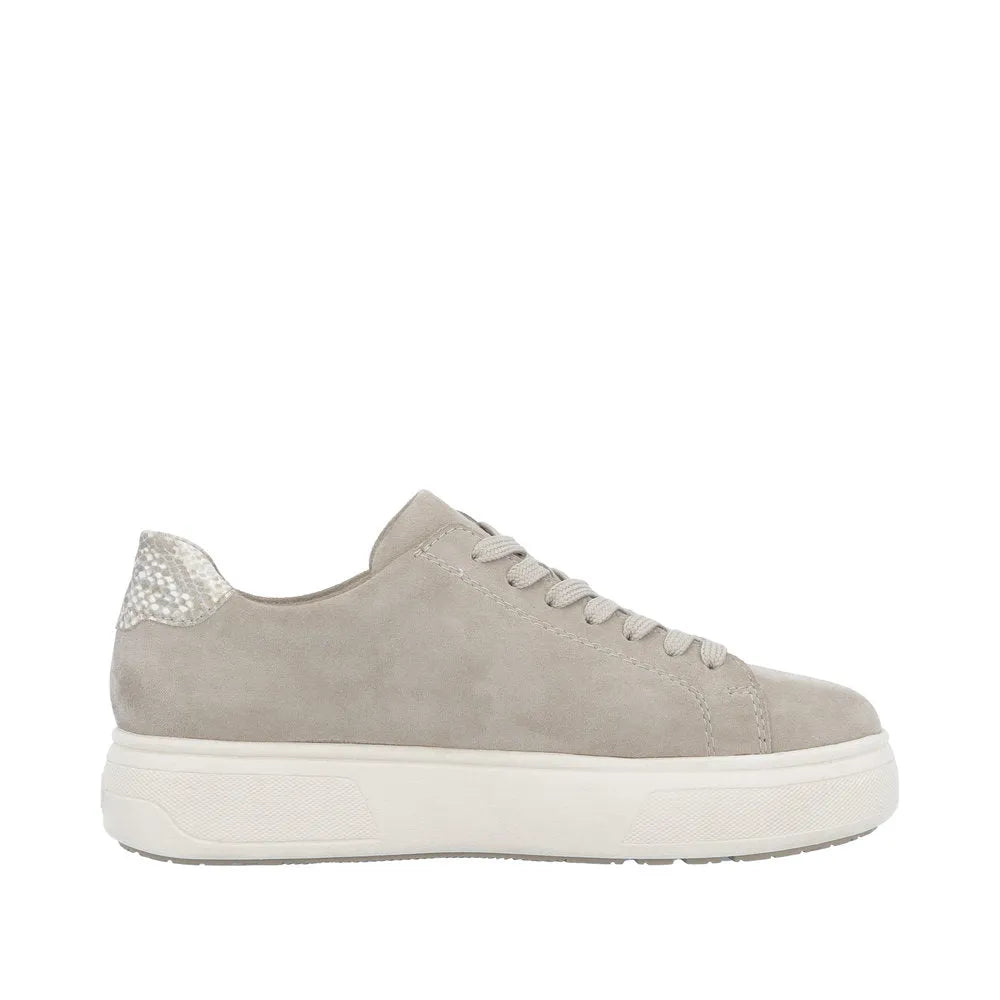 Rieker M7701-60 ladies off-white suede shoes with lace-up front, zip detail, and textured heel accent.
