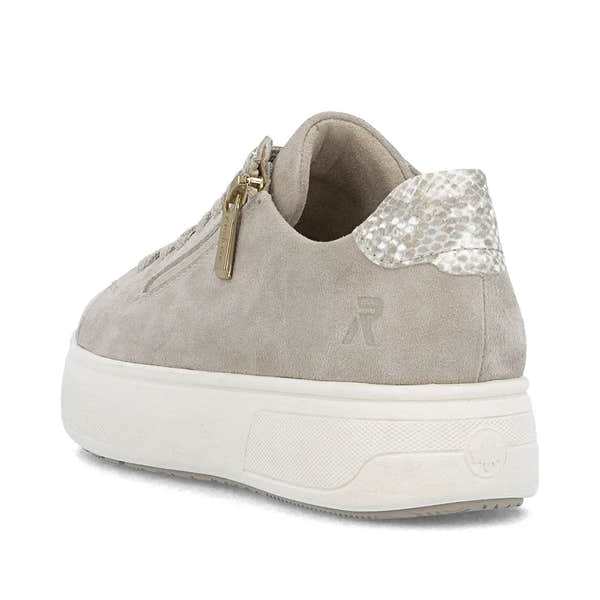 Rieker M7701-60 beige off-white suede sneaker with zip and lace, textured heel detail, and chunky white sole.