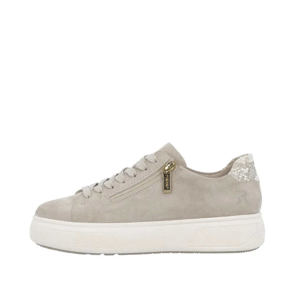 Off-white suede ladies' sneaker with zip and lace details, padded heel, textured accents, and chunky sole.
