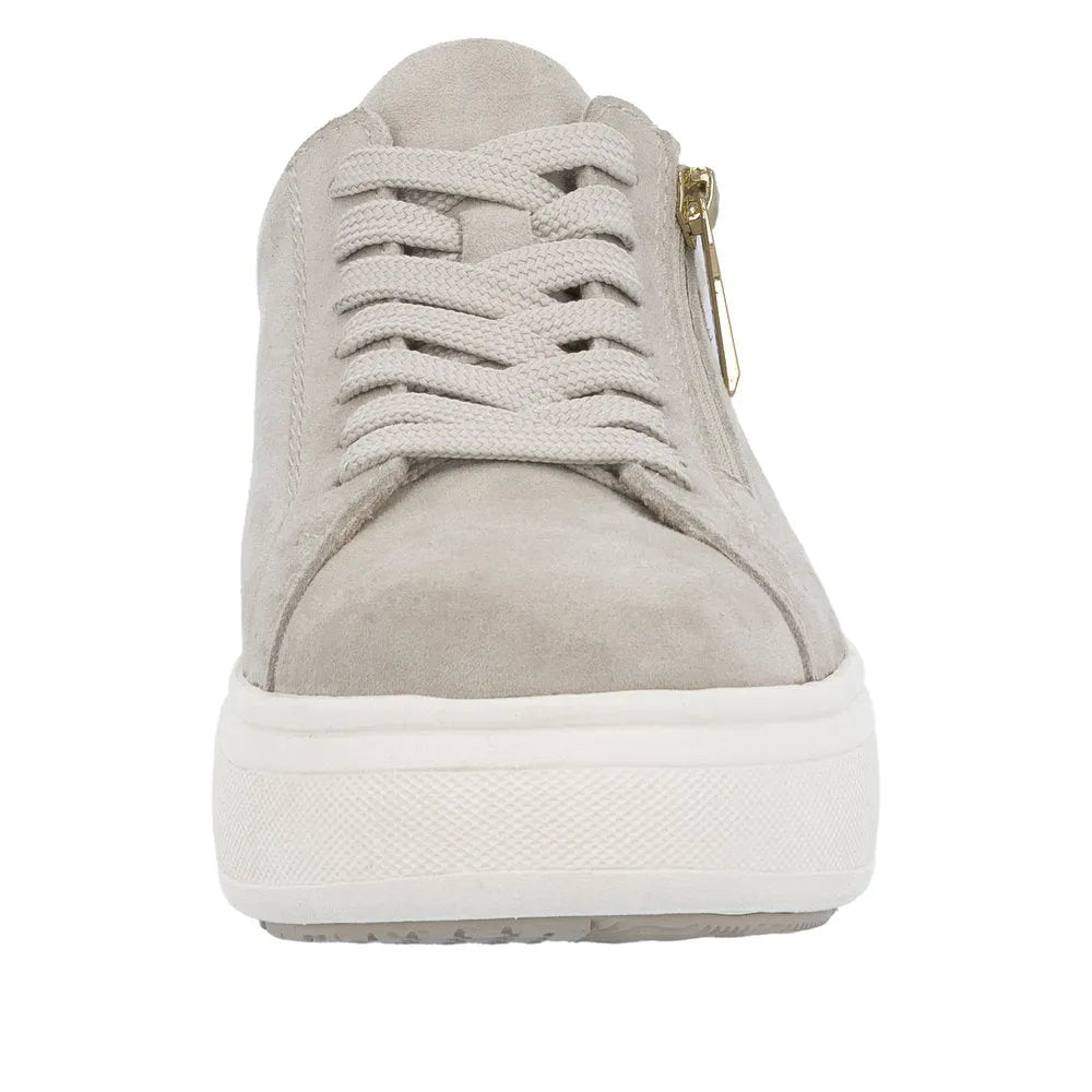 Rieker M7701-60 women's off-white suede sneaker with laces and a side zipper, chunky white sole.
