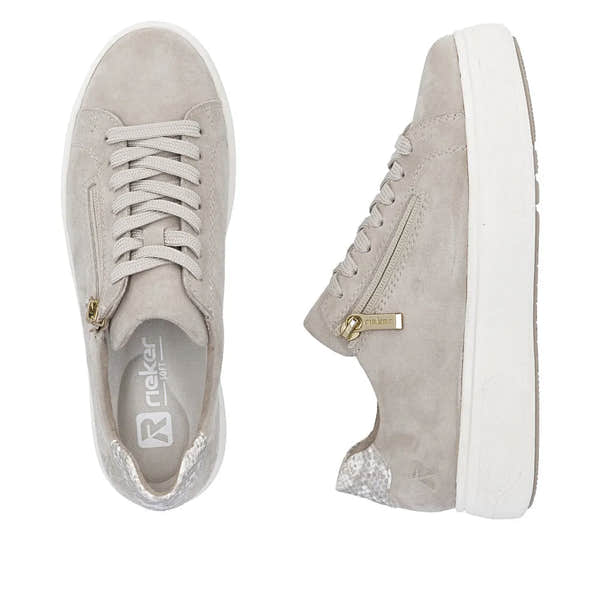 Rieker M7701-60 women's off-white suede sneakers with zip, lace-up front, and textured heel detail.