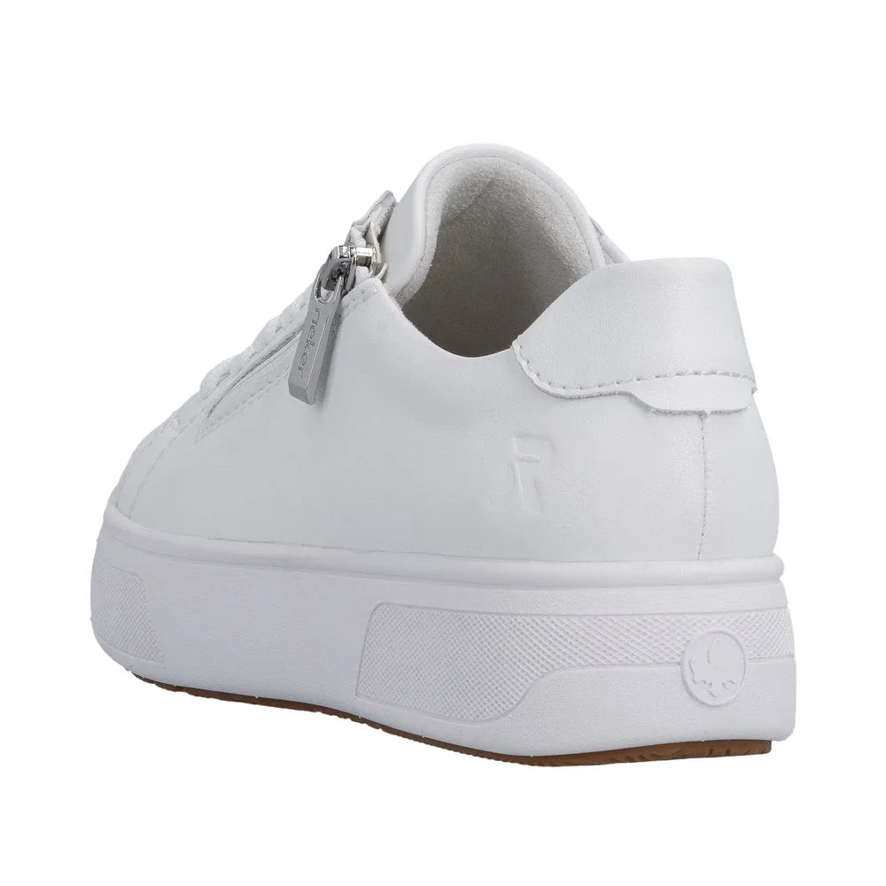 White leather ladies' sneaker with zipper and lace-up design, platform sole, and subtle 