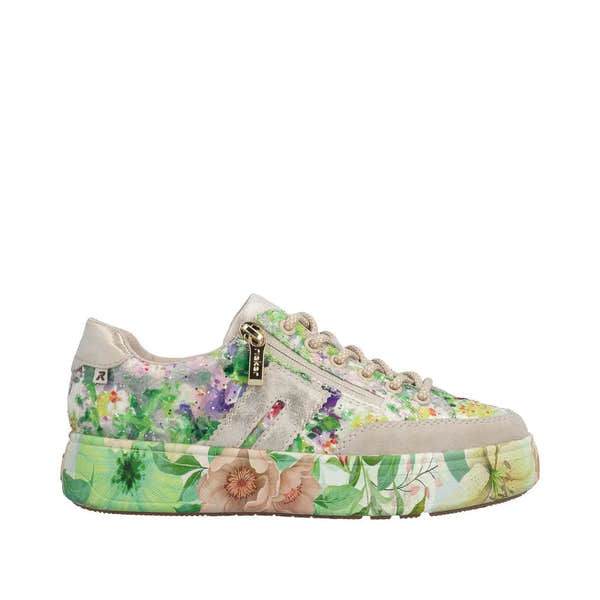 Rieker M7711-91 ladies multi-color canvas trainer with a floral print sole, side zip, laced front, and mixed materials.