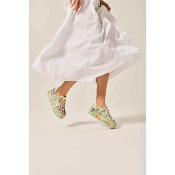 Rieker M7711-91 ladies multi-color sneakers with side zip, floral print, beige laces, and mixed materials.