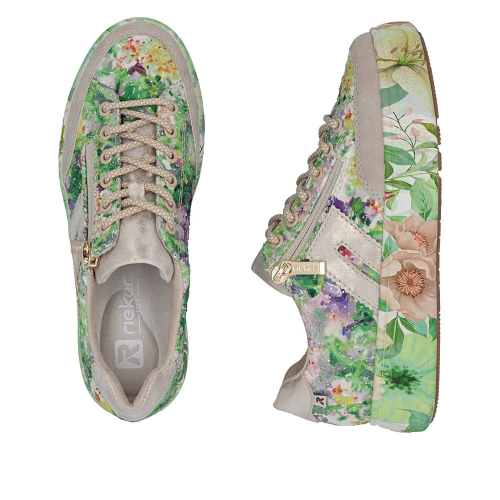 Rieker M7711-91 women's colorful floral side-zip trainers with multicolor fabric, beige accents, and textured laces.