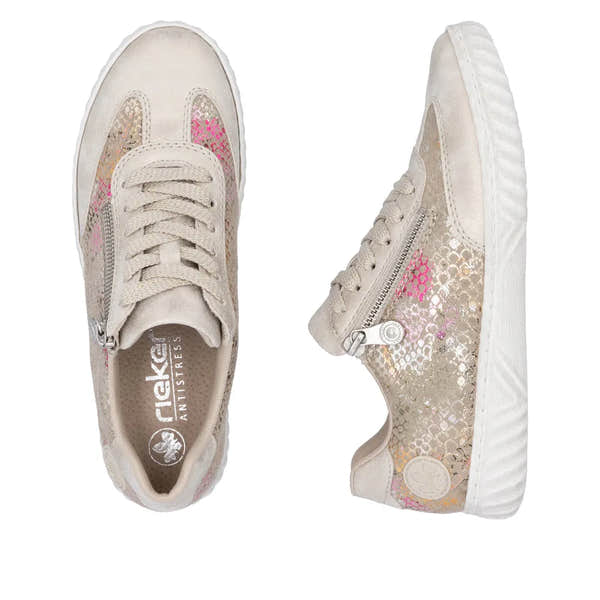 Rieker N0902-90 women's multi-zip and lace sneakers with holographic accents, beige color, and white rubber sole.