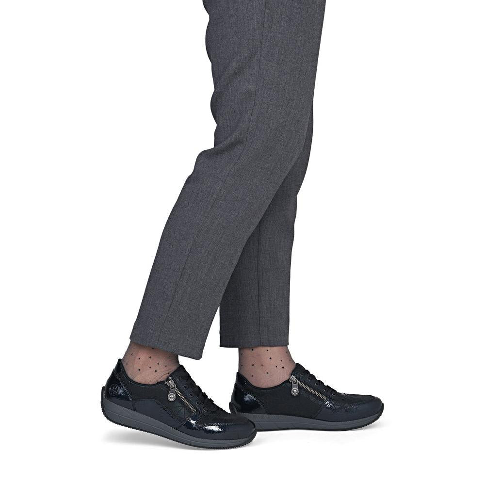 Rieker N1100-14 women's wide navy/black zip & lace shoes, on-foot lifestyle view.