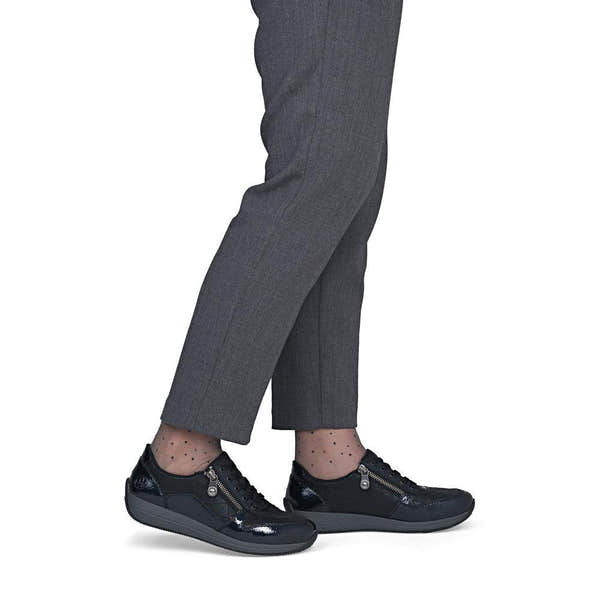 Rieker N1100-14 women's wide navy/black zip & lace shoes, on-foot lifestyle view.