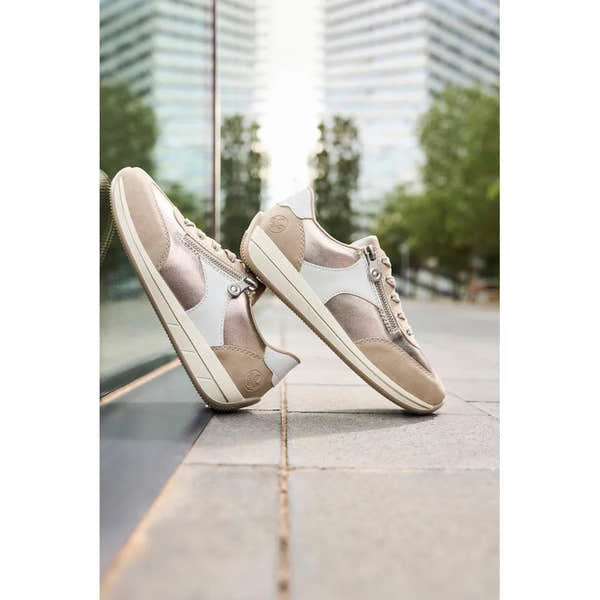 Rieker N1103-90 ladies wide white and champagne zip and lace sneakers with mixed materials and a casual style.