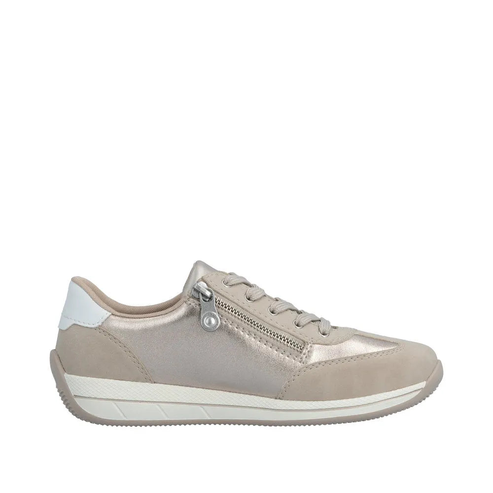 Rieker N1103-90 ladies wide-fit white/champagne sneakers with zipper, laces, and mixed material design.