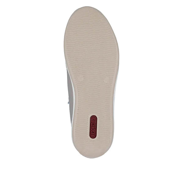 Bright white and champagne wide ladies' shoes with zipper and lace detail, textured sole, and Rieker logo in red.