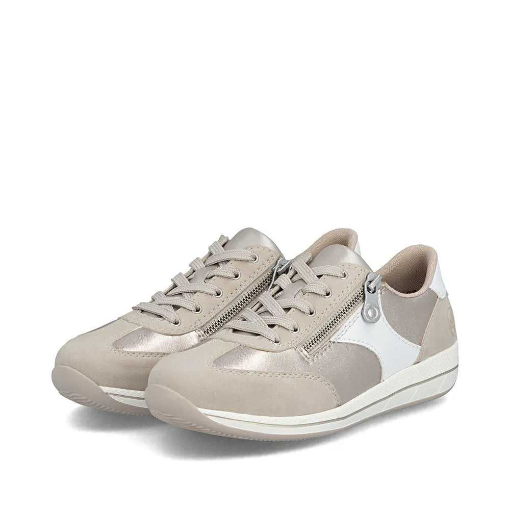 Rieker N1103-90 women's wide-fit sneakers in white and champagne with lace-up, side zipper, and synthetic and leather materials.