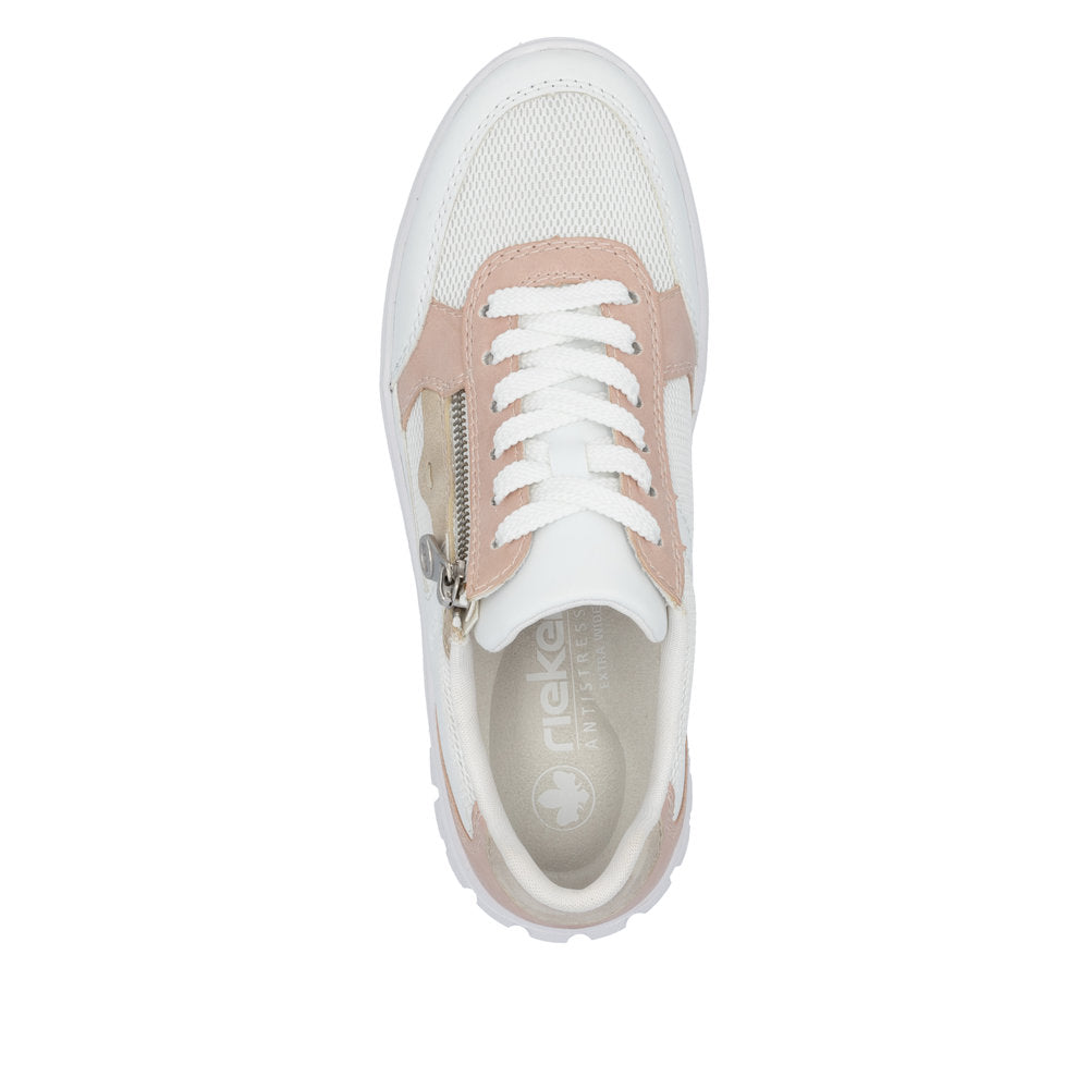 Rieker N1300-90 women's wide-fit trainers with multi-zips and lace closure, in white, pink, and neutral tones, featuring breathable mesh and stylish design.
