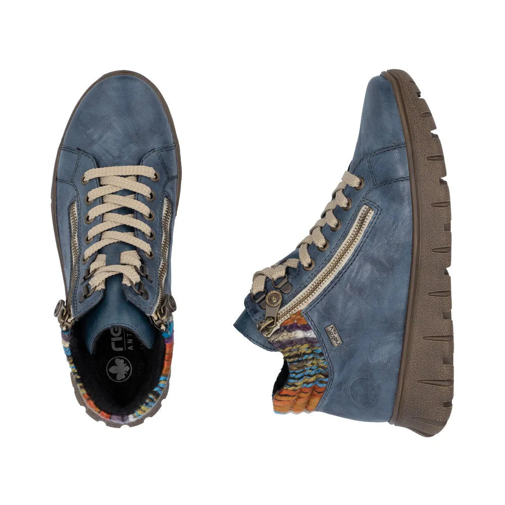 Rieker N1305-14 women's blue leather ankle boots with zip and lace-up design, featuring a colorful interior trim and chunky sole.