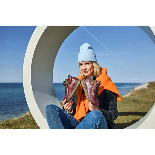 Rieker N1305-35 women's red leather ankle boots with zip and lace-up closure, stylish outdoor footwear for women.