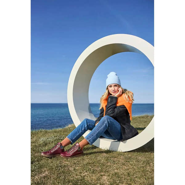 Rieker N1305-35 women's red leather ankle boots with zip and lace-up design, casual outdoor footwear, stylish and comfortable.