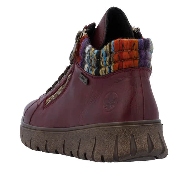 Rieker N1305-35 women's red leather ankle boots with zip, lace-up, and multicolor knit collar, featuring a chunky sole.