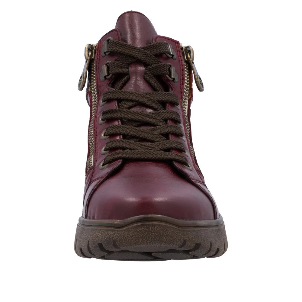 Rieker N1305-35 women's red leather ankle boots with zip and lace-up front, side zipper, and chunky sole.