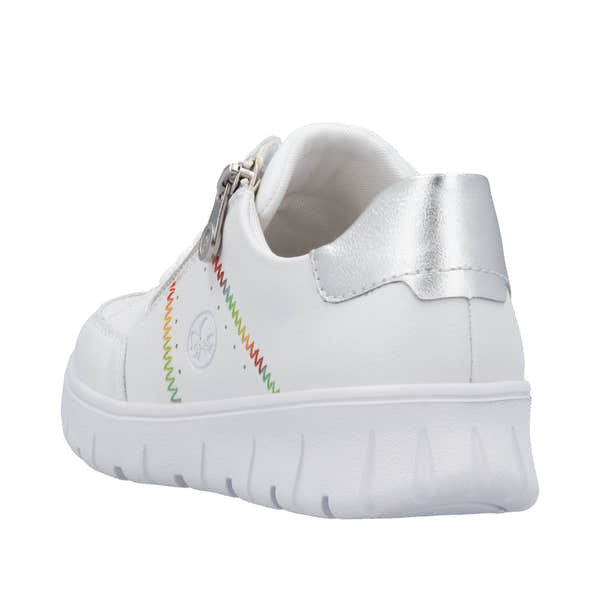 Rieker N1313-80 women's wide white leather trainers with zip and lace, featuring colorful stitched designs and silver heel detail.