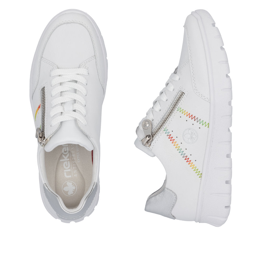 Rieker N1313-80 women's wide white leather trainers with zip and lace-up closure, colorful zigzag detail, cushioned insole, lightweight sole.