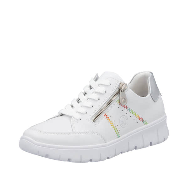 Rieker N1313-80 ladies' wide-fit white leather trainers with zip and lace-up closure, colorful stitch detail, and silver accents.