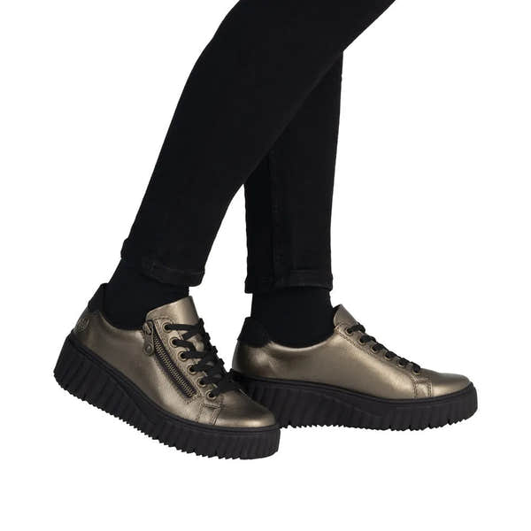 Rieker N2501-90 Ladies Bronze Leather Trainers with Zip and Lace-Up Detail, chunky black sole, stylish and comfortable footwear.