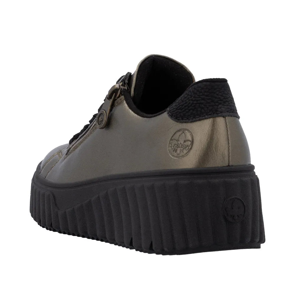 Rieker N2501-90 ladies bronze leather trainers with zip, lace-up, chunky black sole, and textured heel.
