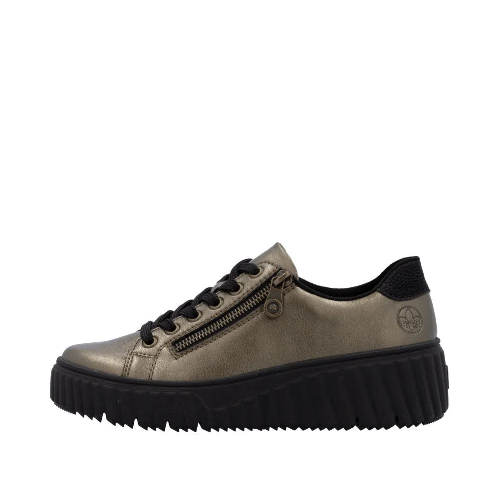 Rieker N2501-90 ladies bronze leather trainers with side zipper, lace-up detail, and chunky black sole.