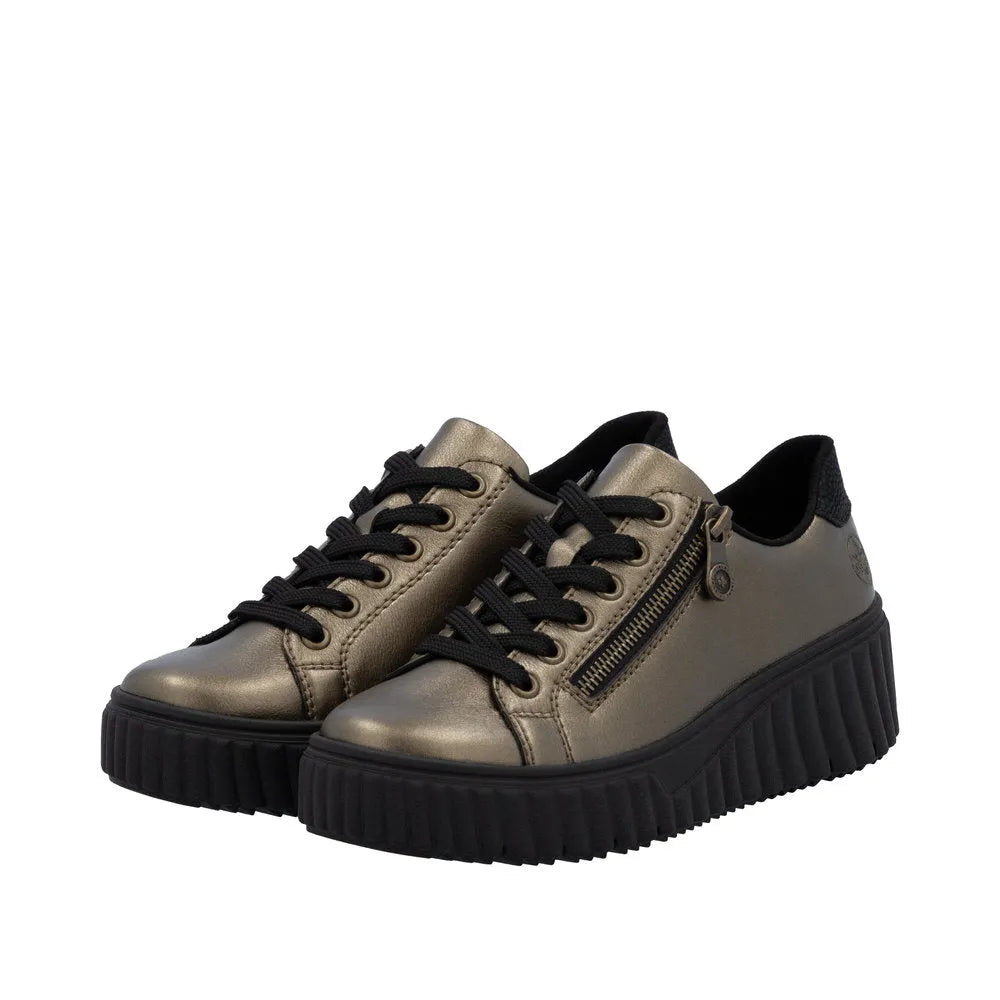Rieker N2501-90 ladies bronze leather trainers with lace-up front, side zipper, and chunky black sole.