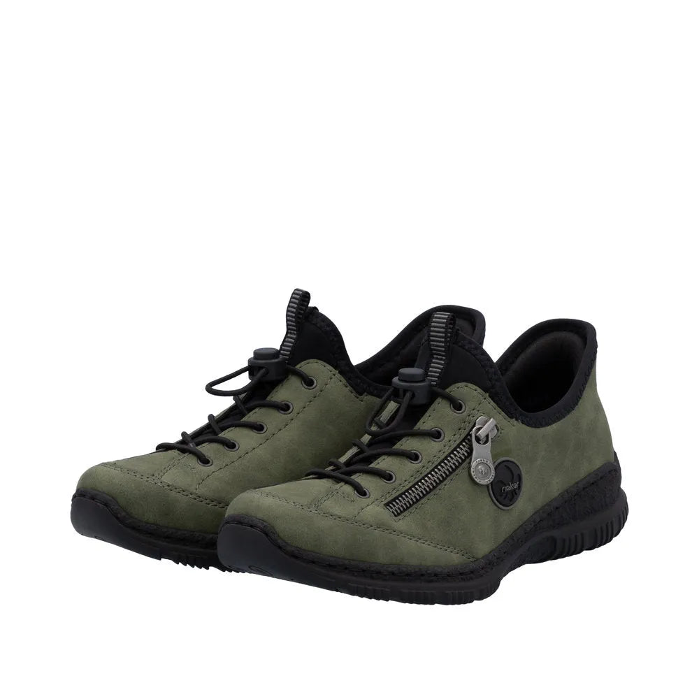 Rieker N3267-54 ladies green slip-on shoes with black sole, lace-up design, and side zipper for easy wear.