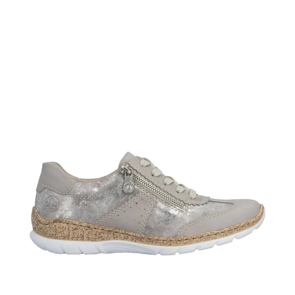 Rieker N4221-90 ladies rose-metallic sneakers with lace, zipper detail, cushioned sole, and textured beige midsole.