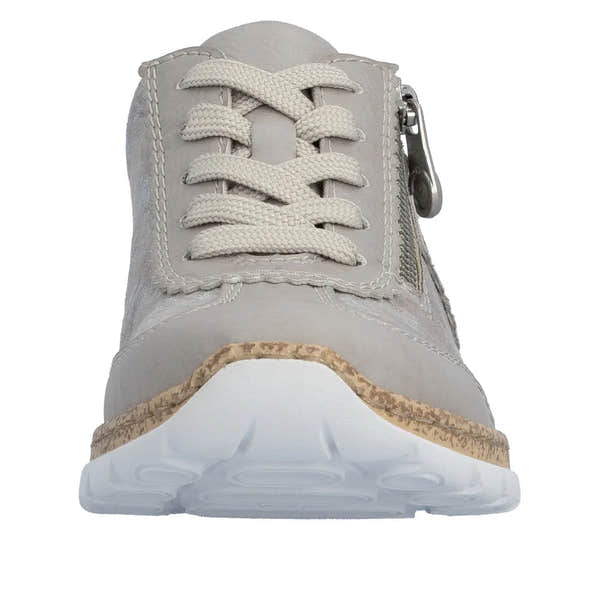 Rieker N4221-90 ladies rose-metallic lace-up shoe with zip, beige material, cushioned sole, and decorative cork detail.