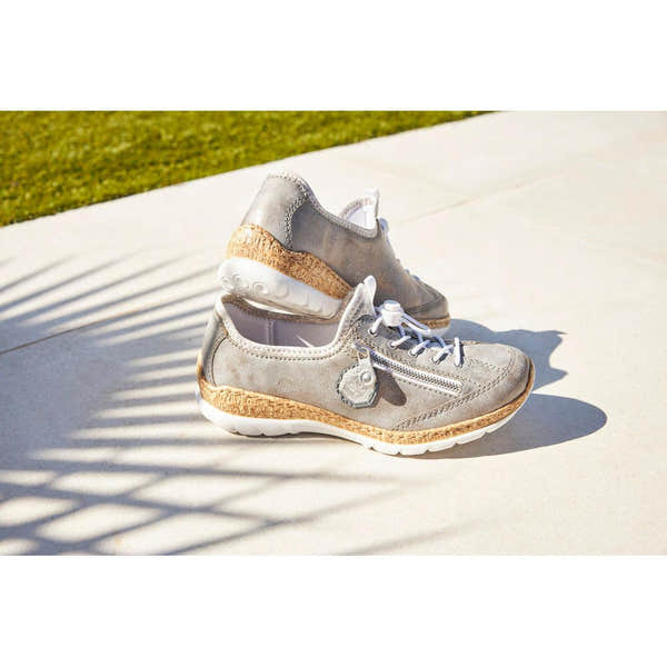 Rieker N4263-40 ladies grey and silver elasticated casual shoes with cork midsoles and side zippers.