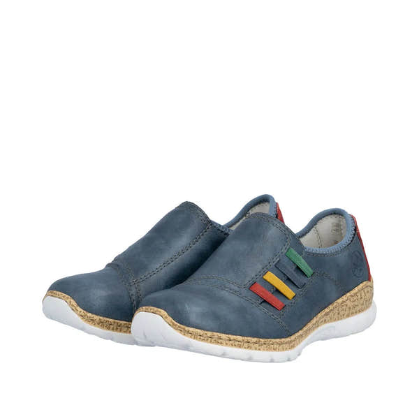 Blue elasticated shoes with a textured upper, cork-style midsole, and colorful stripes in green, red, and yellow.