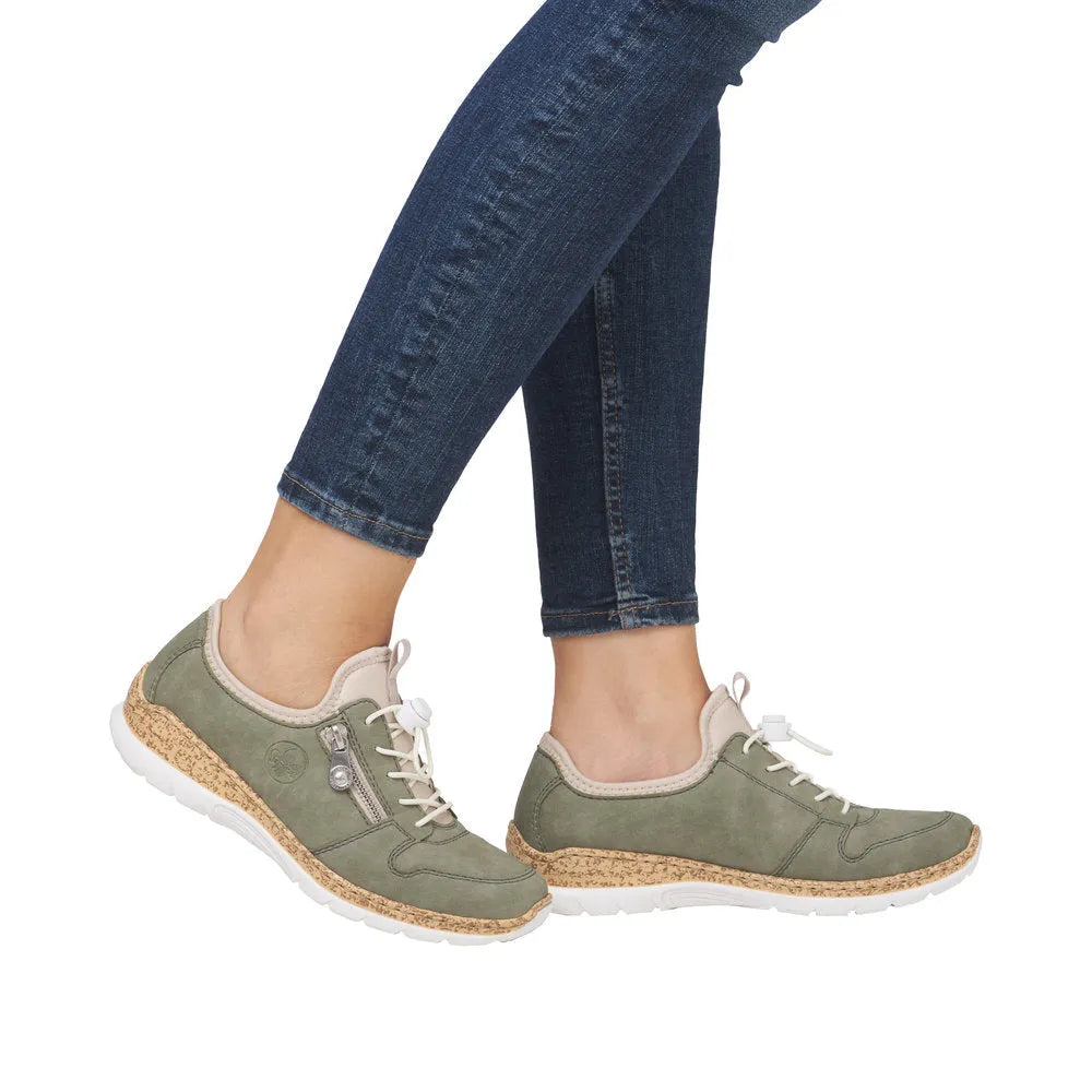 Rieker N42G0-52 ladies green elasticated casual shoes with cork sole and lace-up design.