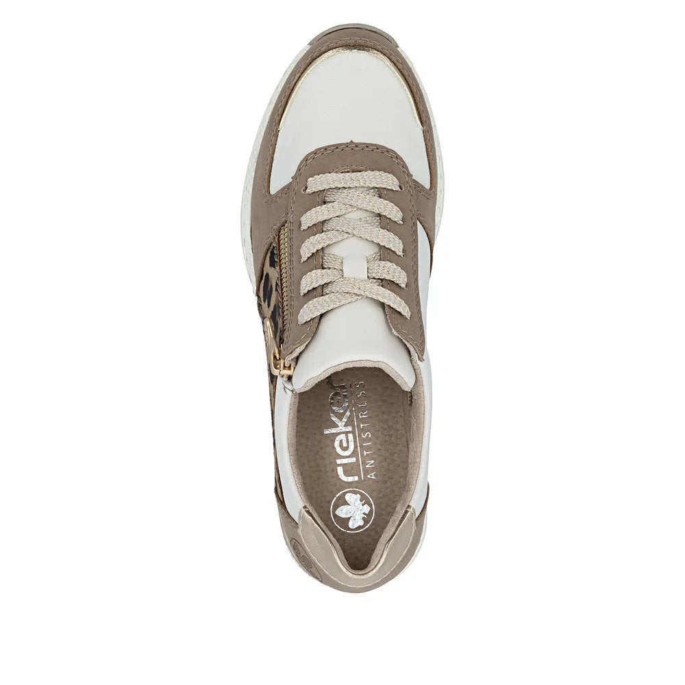 Rieker N4308-64 ladies wide trainers in taupe, white, and leopard print with lace-up, zipper, and mixed materials.